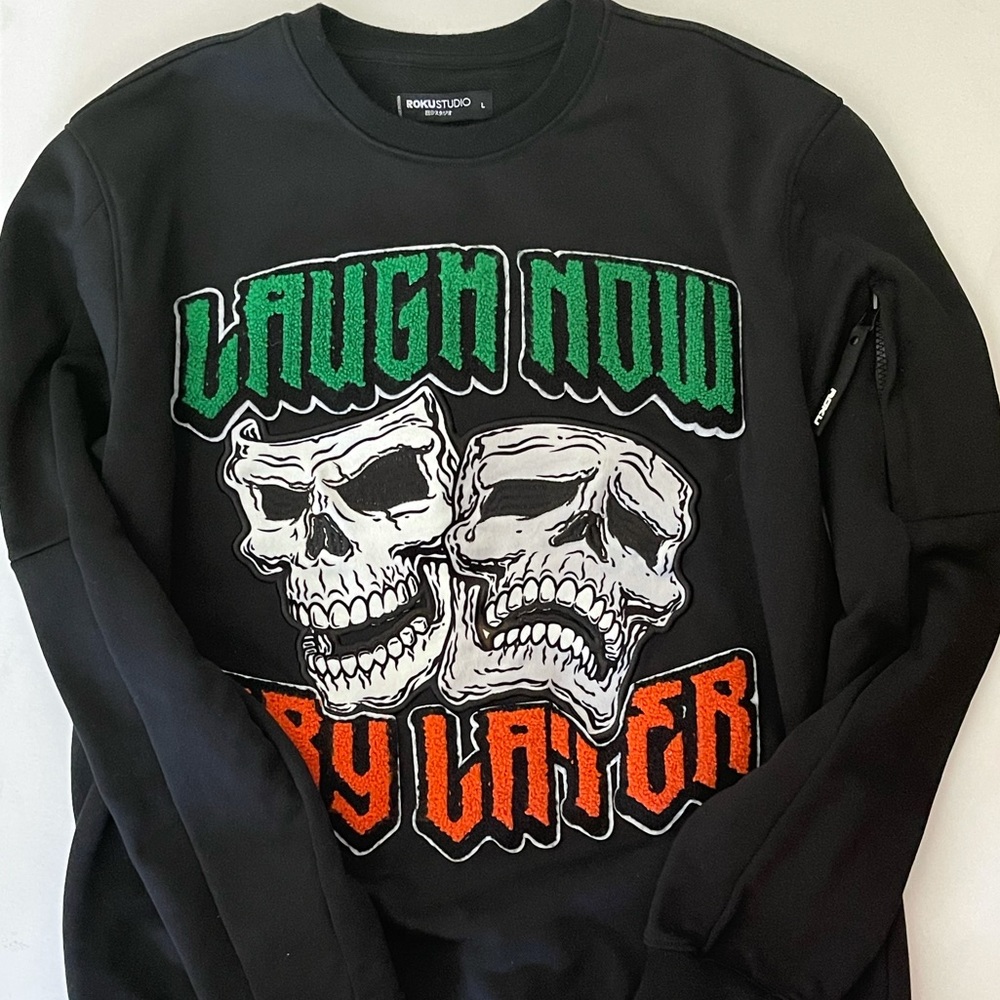 roku studio laugh now, cry later sweatshirt